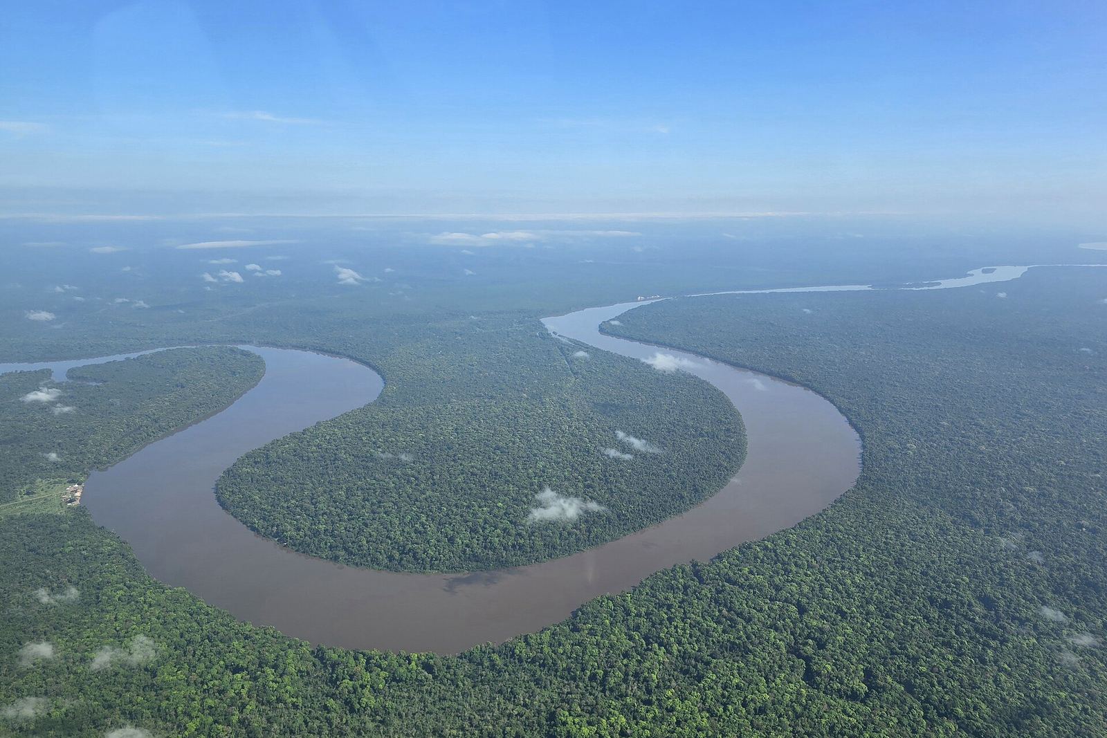 The Corantijn River winding through rainforest in West Suriname