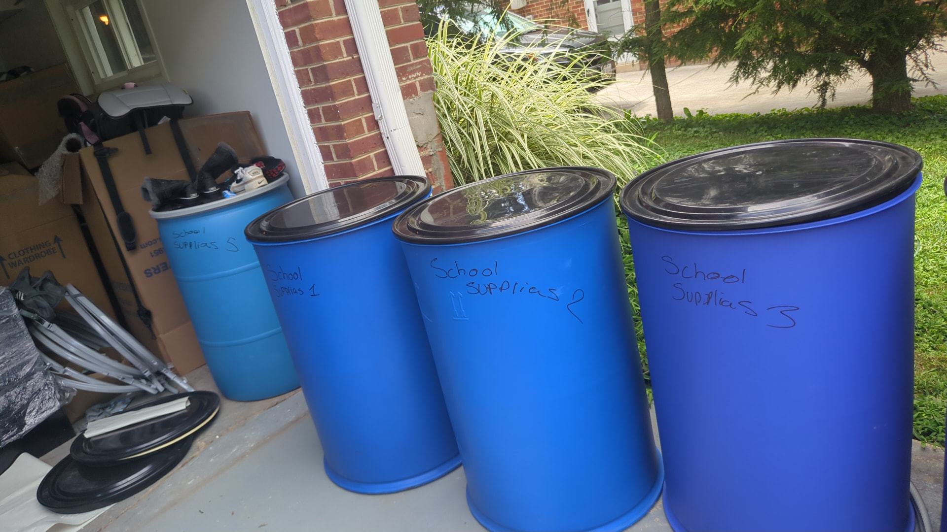 Sealed and labelled humanitarian barrels prepared for shipment to Suriname